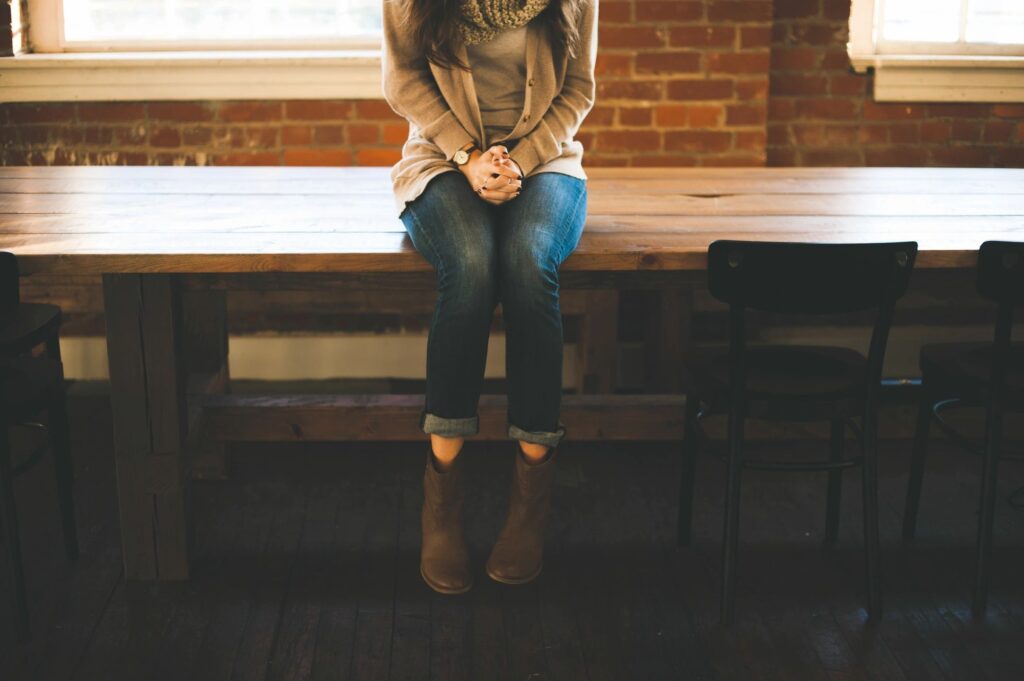 woman sitting on bench